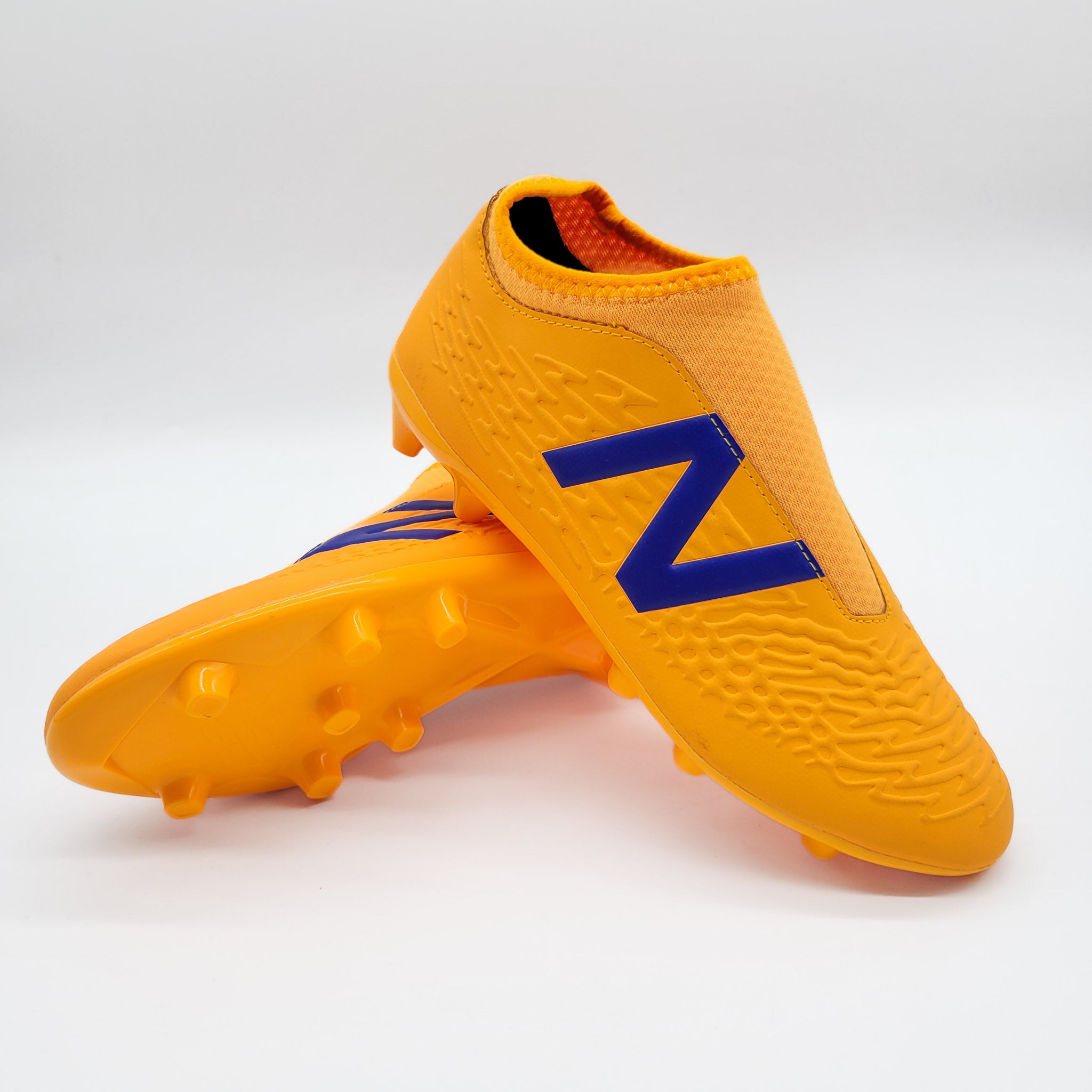 New Balance Tekela V3+ Laceless FG Tacos de Fútbol