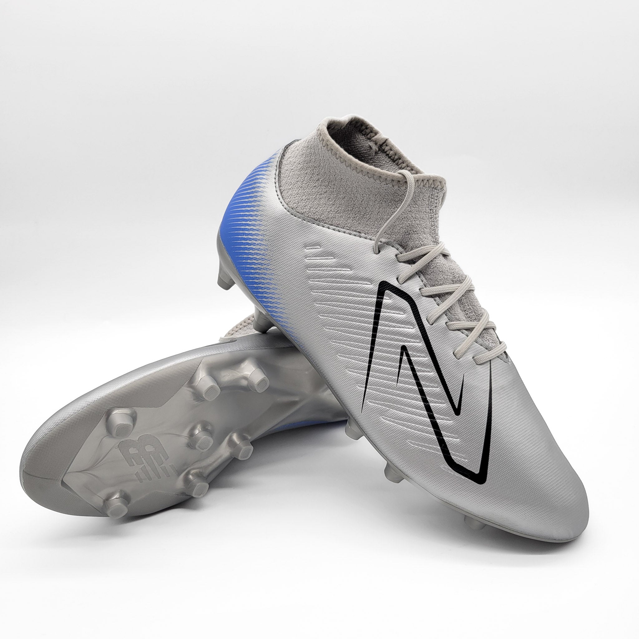 New Balance Tekela V4 Magique FG Tacos de Fútbol
